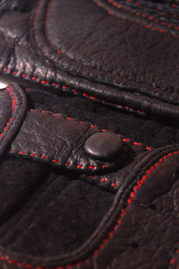 Button detail of black Fingerless Peccary Driving Gloves for Gentleman by Ines Gloves