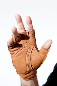 Palm of Hand wearing Grey Fingerless Peccary Driving Gloves for Gentleman by Ines Gloves