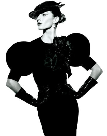 Gisele Bundchen wearing gaunlet long leather gloves photography by Peter Lindbergh