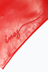 Red embroidery of Ines Gloves Logo on leather gloves