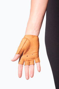 Palm of hand wearing fingerless cork  leather gloves for woman by Ines Gloves.